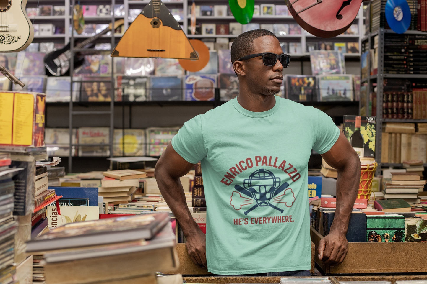 Enrico Pallazzo Baseball Tee – “He’s Everywhere” Naked Gun Parody Shirt